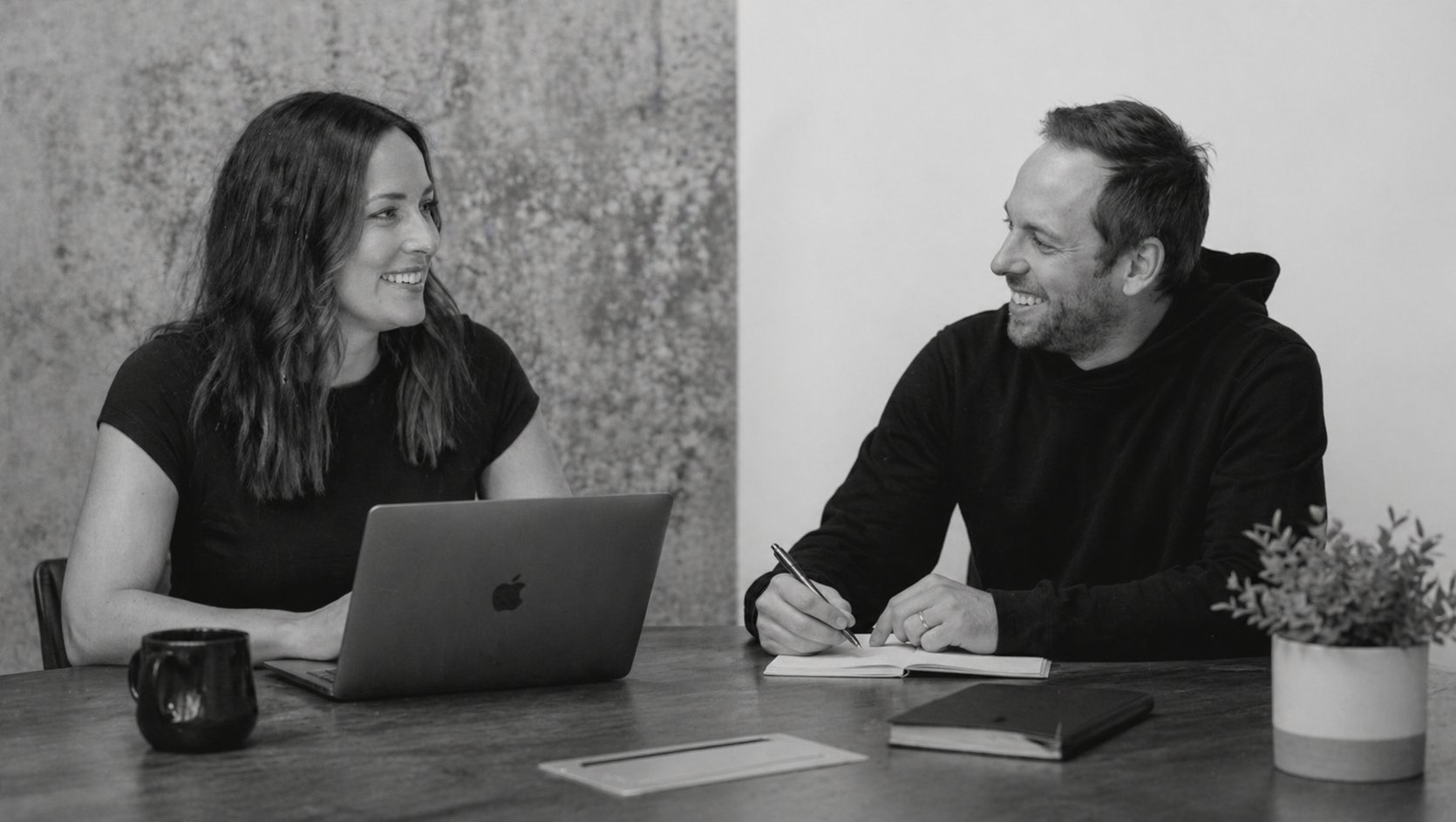 Chloe and Aaron working together at a table